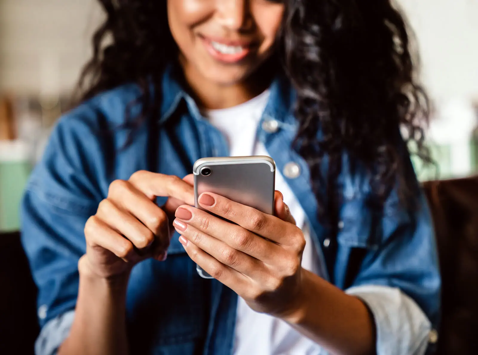 Woman scrolling on her phone